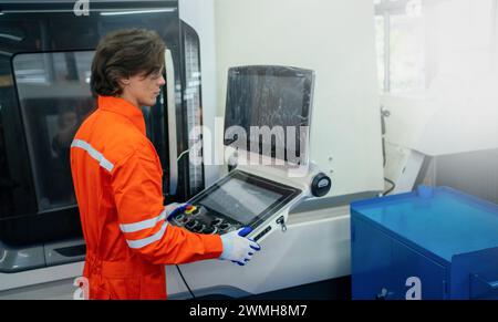 Mechanical engineer using coordinate measuring machine CMM measurement technologies at production line in the industry factory. Stock Photo