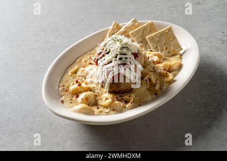 Spicy cream shrimp fondue Korean food dish Brick Pasta Rosé Cream Shrimp Tteokbokki Mac and Cheese Potatoes Tomato Meatlover Pasta Stock Photo