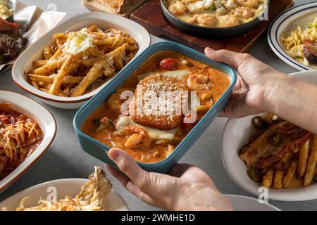 Spicy cream shrimp fondue Korean food dish meal Brick Pasta Rosé Cream Shrimp Tteokbokki Mac and Cheese Potatoes Tomato Meatlover Pasta Stock Photo