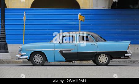 027 Old light and dark blue almendron car -yank tank, Plymouth classic- from 1956 on the Paseo del Prado promenade. Havana-Cuba. Stock Photo