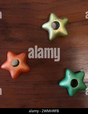 Three Color Star Three stars on dark background Stock Photo - Alamy