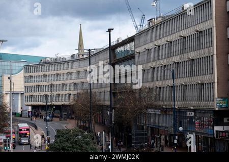 Ringway Centre, a classic of Brutalist architecture which is due to be demolished to make way for flats on 26th February 2024 in Birmingham, United Kingdom. Ringway Centre is a Grade B locally listed building located on Smallbrook Queensway in the city centre. The six-storey, 230 metres long building was designed by architect James Roberts as part of the Inner Ring Road scheme in the 1950s and is notable for its gentle sweeping curved frontal elevation. In July 2016, the building was refused listed status by Historic England which enables redevelopment to take place. Stock Photo