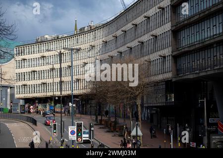 Ringway Centre, a classic of Brutalist architecture which is due to be demolished to make way for flats on 26th February 2024 in Birmingham, United Kingdom. Ringway Centre is a Grade B locally listed building located on Smallbrook Queensway in the city centre. The six-storey, 230 metres long building was designed by architect James Roberts as part of the Inner Ring Road scheme in the 1950s and is notable for its gentle sweeping curved frontal elevation. In July 2016, the building was refused listed status by Historic England which enables redevelopment to take place. Stock Photo