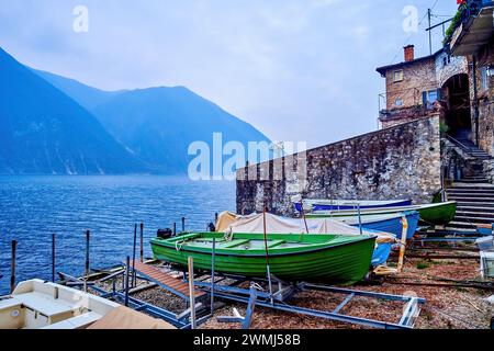 Fishing boats on dry storages in small boat yard in Gandria, Switzerland Stock Photo