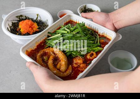 Beef gopchang gopdoritang, flying fish roe rice balls, and gopchang ...
