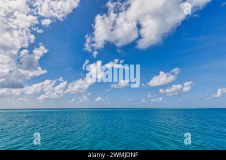 Crystal clear sea water bay. Pristine ocean lagoon sunny cloudy sky, idyllic relax seascape. Transparent surface exotic travel. tropics Mediterranean Stock Photo