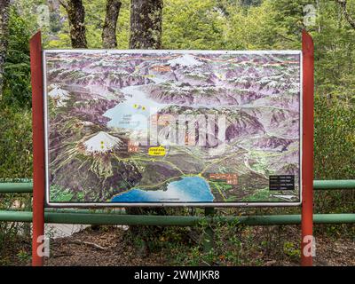 Signpost at National Park Vicente Perez Rosales, map of lake region,  Chile Stock Photo