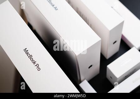 BERLIN , GERMANY - FEBRUARY 14 2024: Close up box from MacBook Pro and Air and Apple products on the table. Stock Photo