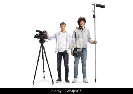 Team of boom and camera operators with recording equipment isolated on white background Stock Photo