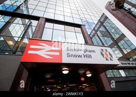 The entrance to Birmingham Snow Hill, one of the main train stations in the City Centre. Snow Hill is near the business district of Birmingham and exits here onto Colmore Row. Stock Photo