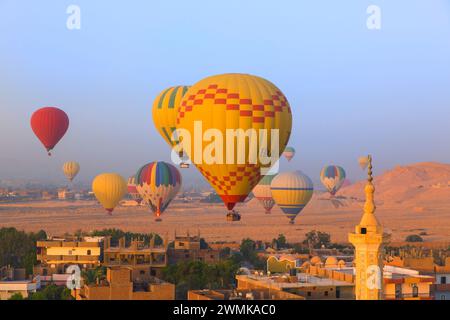 NA Hot air balloons carrying tourists over luxor, Egypt Stock Photo
