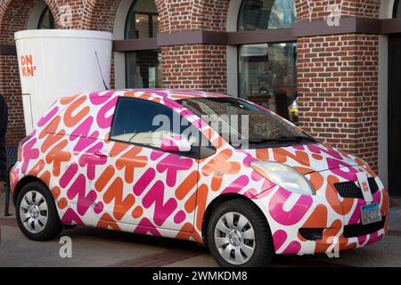 Newport, RI. Jan. 25, 2024. Dunkin Donuts sponsored the ice carving event that was part of the  Newport Winter Festival 2024. @ Veronica Bruno / Alamy Live News Stock Photo