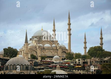 The Suleymaniye Mosque on the Third Hill with a ferries on the banks of ...