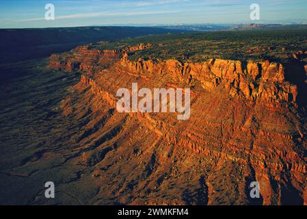 Sandstone-capped escarpment glows in the setting sun in Vermilion Cliffs National Monument. The 280,000-acre wilderness is located at the Utah/Ariz... Stock Photo