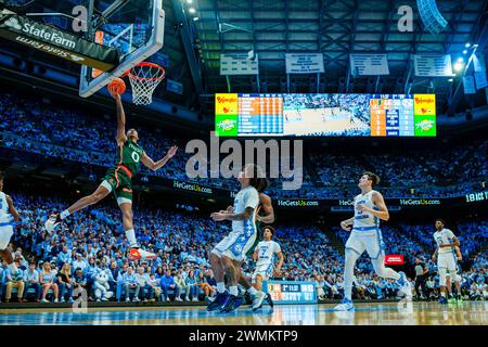 Chapel Hill, NC, USA. 26th Feb, 2024. Miami (Fl) Hurricanes guard Matthew Cleveland (0) shoots against the North Carolina Tar Heels in the ACC basketball matchup at Dean Smith Center in Chapel Hill, NC. (Scott Kinser/CSM). Credit: csm/Alamy Live News Stock Photo