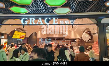 SHANGHAI, CHINA - FEBRUARY 25, 2024 - Consumers line up to buy at GRACE Bakery in Shanghai, China, February 25, 2024. Stock Photo