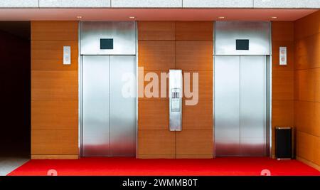 Two elevator doors in luxurious building Stock Photo