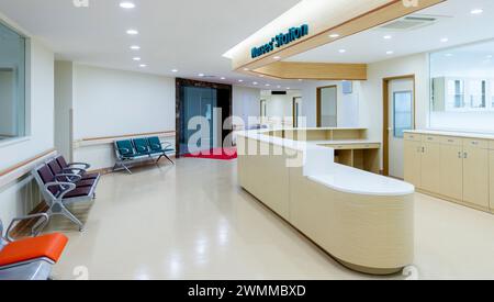 Empty nurses station and corridor in a hospital Stock Photo