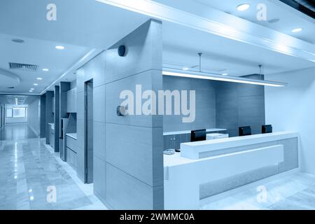 Empty nurses station counter in a hospital Stock Photo