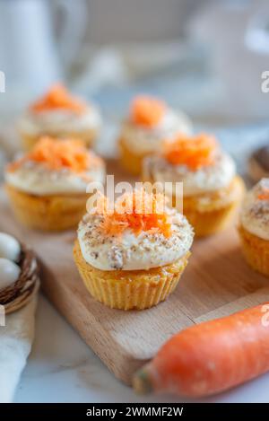 Homemade Carrot Cupcakes with Cream Cheese Frosting for Easter Stock Photo