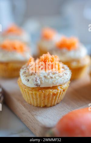 Homemade Carrot Cupcakes with Cream Cheese Frosting for Easter Stock Photo
