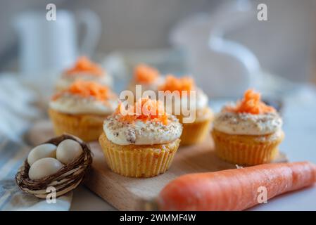 Homemade Carrot Cupcakes with Cream Cheese Frosting for Easter Stock Photo