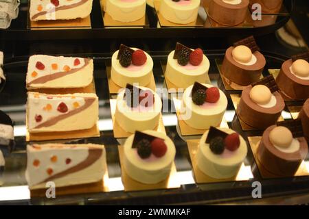 A close-up of Bavarian sweets in a glass display case Stock Photo