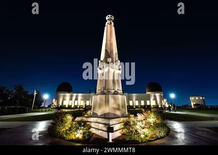 The Astronomers Monument in front of Griffith Observatory at Night - Los Angeles, California Stock Photo