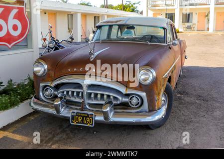 vintage packard sedan with rusty patina on route 66 seligman arizona usa JOR 490 Stock Photo