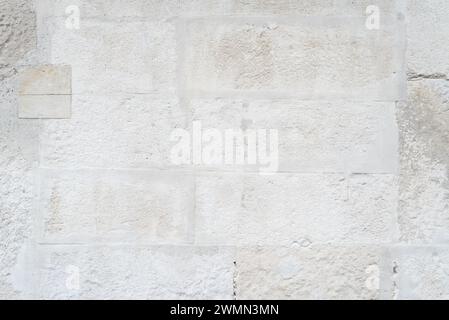 Texture of the wall of the old house. Masonry of white brick. Beige background for design Stock Photo