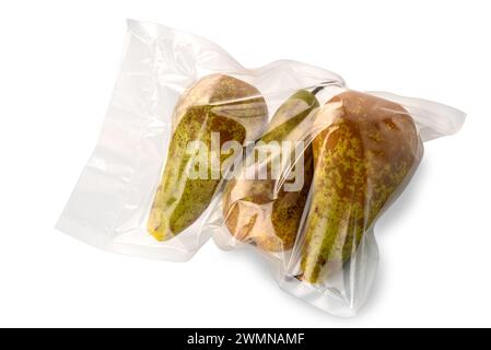 Pears in vacuum pack for sous vide cooking isolated on white with clipping path included Stock Photo