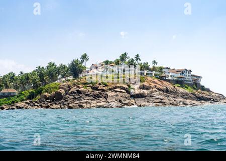 Kovalam is an internationally renowned beach with three adjacent crescent beaches. It has been a favorite haunt of tourists since the 1930s. Stock Photo