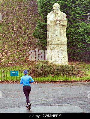 Glasgow, Scotland, UK. 27th February, 2024. UK Weather:  Wet day saw spring weather for locals in  kelvingrove park in the west end under the shadow of the statue of Thomas Carlyle. Credit Gerard Ferry/Alamy Live News Stock Photo