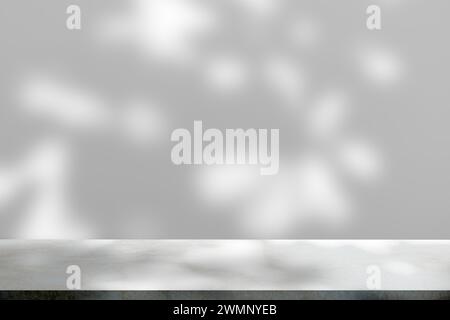 Sunlight casting shadow on white wall Stock Photo