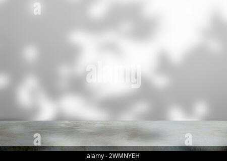 Sunlight casting shadow on white wall Stock Photo
