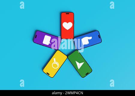 Five mobile phones arranged in star shape showing different computer icons of love, like, share, search and comment. social media and online marketing Stock Photo
