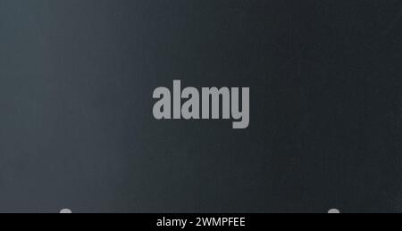Black gradient glossy paper background macro close up view Stock Photo