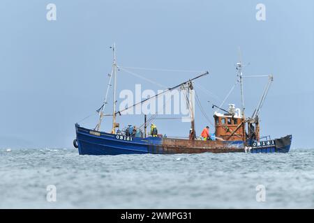 Fishing boat at sea off the Isle of Arran, Scotland, June Stock Photo