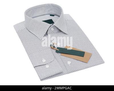 White folded men's shirt with polka dots in black color isolated on white background Stock Photo