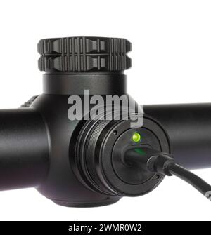 Infrared telescopic rifle sight used to shoot in the dark being recharged Stock Photo