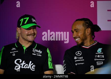 Sakhir, Bahrain. 22nd Feb, 2024. BAHRAIN, Sakhir, February 22: Valtteri BOTTAS, FIN, Stake SAUBER F1 Team and Lewis HAMILTON, GBR, Mercedes AMG F1 Team during day two of F1 Testing at Bahrain International Circuit on February 22, 2024 in Bahrain, Formula 1 pre season tests, picture & copyright Jerry ANDRE/ATP images (ANDRE Jerry/ATP/SPP) Credit: SPP Sport Press Photo. /Alamy Live News Stock Photo