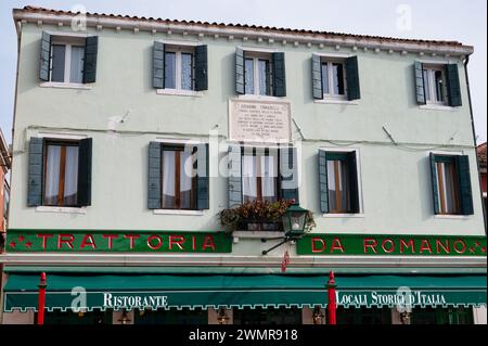 Burano, Italy- Feb 25, 2023: A Trattoria da Romano restuarant in Burano Italy. Stock Photo