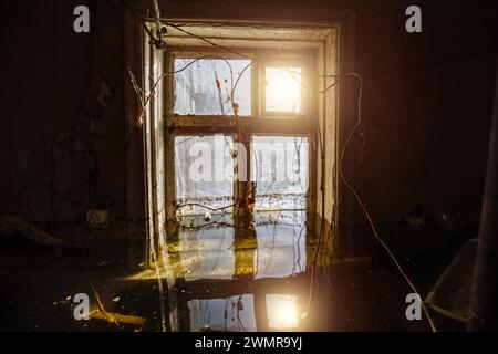 Flooded old house. Flooded old window. Natural disaster concept. Stock Photo