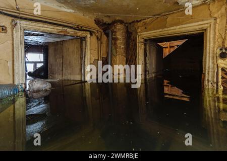 Flooded old house interior. Natural disaster concept. Stock Photo