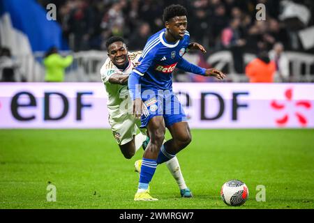 Decines Charpieu, France. 27th Feb, 2024. Ernest NUAMAH of Lyon and Saidou SOW of Strasbourg during the French Cup, Quarter-Finals football match between Olympique Lyonnais (Lyon) and RC Strasbourg on February 27, 2024 at Groupama stadium in Decines-Charpieu near Lyon, France - Photo Matthieu Mirville/DPPI Credit: DPPI Media/Alamy Live News Stock Photo