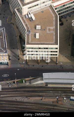 Aerial view of a modern office building rooftop featuring HVAC ...