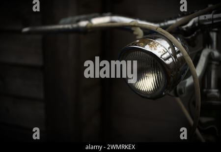 Close-up of a rusty bicycle lamp. chrome lamp on a vinatge velo. Stock Photo