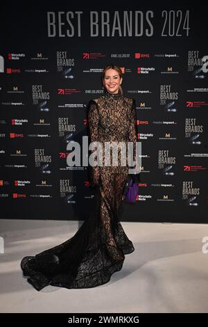 Munich, Germany. 27th Feb, 2024. Actress Laura Osswald stands on the white carpet at the gala for the Best Brands Awards 2024, Hotel 'Bayerischer Hof'. Credit: Felix Hörhager/dpa/Alamy Live News Stock Photo