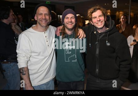 Munich, Germany. 27th Feb, 2024. The band Sportfreunde Stiller Florian 'Flo' Weber (l-r) Peter Brugger and Rüdiger 'Rüde' Linhof stand on the white carpet at the gala for the Best Brands Awards 2024, Hotel 'Bayerischer Hof'. Credit: Felix Hörhager/dpa/Alamy Live News Stock Photo