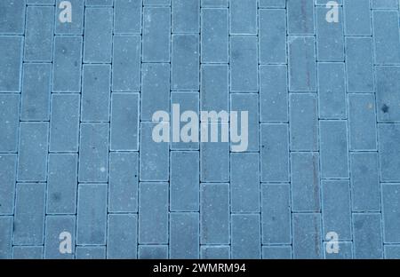 old wooden cobblestones, useful as background, in blue tones. Stock Photo